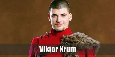 Viktor Krum’s costume is a red long-sleeved formal top, brown pants, black knee-high boots, a black belts, and a fur-lined red shoulder cape.
