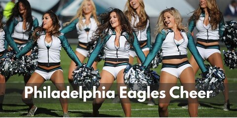 Wear a layered bra top and shorts that match the white, black, and green color of the Eagles. Carry pompoms and wear silver boots, too.